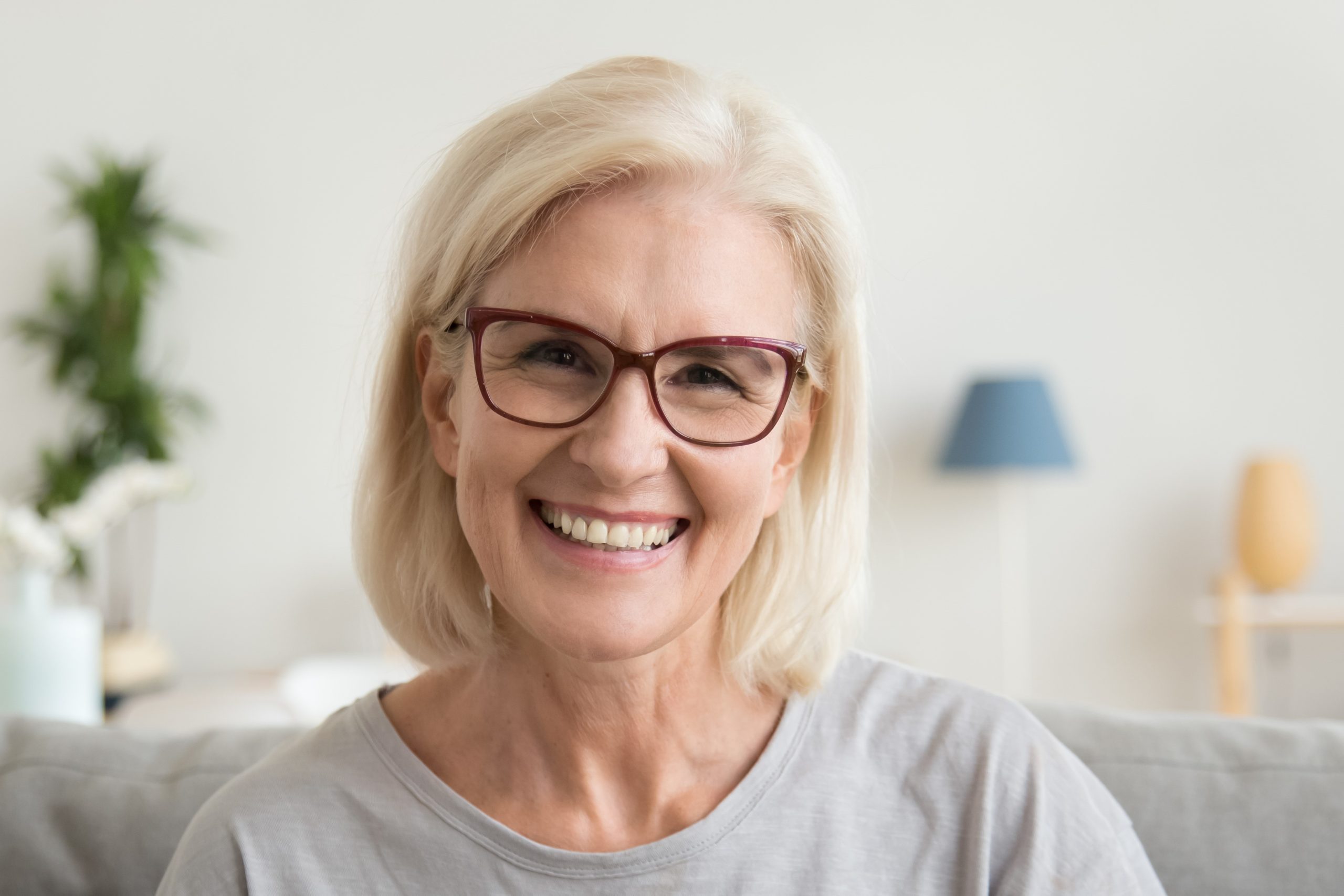 Smiling,Middle,Aged,Mature,Grey,Haired,Woman,Looking,At,Camera,